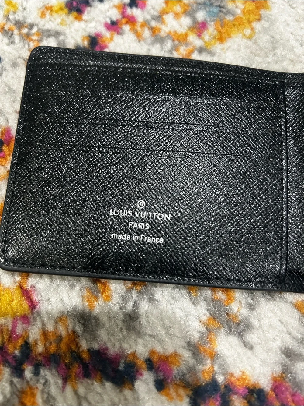 Louis Vuitton sleek money